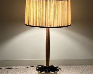 BRASS AND WOOD TABLE LAMP  |  
The lower section having a brass base in with handles and two removable inserts, possibly for planting - h. 32 x dia. 18 in. (over shade)