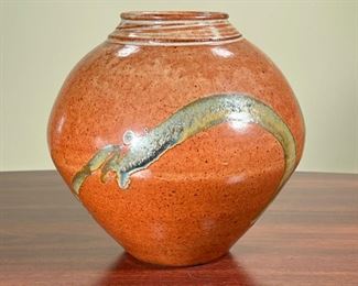 LYNETTE KING VASE  |  
Art pottery vase made by Lynette King, having an orange glaze - h. 9 1/2 x dia. 10 in.