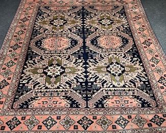 GEOMETRIC CARPET  |  
Having six medallions on a blue field in a salmon border with cross devices - l. 117 x w. 78 in.
