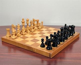 CHESS SET  |
Chess board and box of pieces Box labeled Au Nain Bleu, one complete set plus extra sets of pawns - l. 13 x w. 13 x h. 1 in.