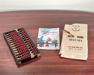 CHINESE ABACUS  |
Diamond brand Chinese abacus with instructions on bead math - l. 10 x w. 5 in.