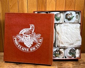 (12pc) BOXED PORCELAINE D'AUTEUIL  |
Service Chasse, new in original box, six demitasse cups and six saucers (dia. 5.25 in.) - l. 10.75 x w. 10.75 in. (box)
