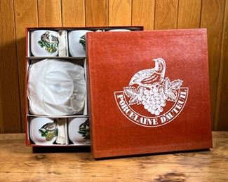 (10pc) BOXED PORCELAINE D'AUTEUIL  |
New in original box, six demitasse cups and six saucers (dia. 5.25 in.) in Service Chasse pattern - l. 10.75 x w. 10.75 in. (box)
