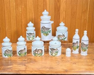 (10pc) D'AUTEUIL KITCHEN CONTAINERS  |
Porcelaine D'Auteuil "Service Chasse" canisters, including three 6.5-inch tall lidded jars, three larger jars with lids with spoon openings, a 10.75-inch canister with a single handle, olive and vinegar bottles, and a single salt shaker