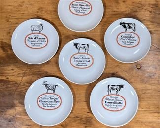 (6pc) FRENCH CHEESE PLATES  |
Porcelaine D'Auteuil regional cheese plates showing different cows and sheep and describing different types of cheese - dia. 7.5 in.