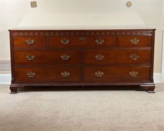 BAKER FURNITURE DRESSER  |
Long dresser/chest of drawers, having three drawers over four drawers with a nicely figured constraining wood top and blind fretwork details - l. 71.5 x w. 18.75 x h. 31.75 in.
