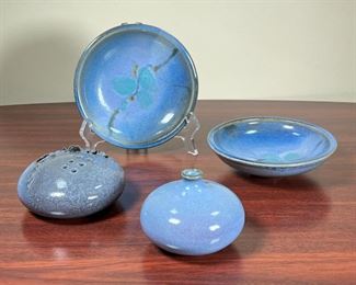 (3pc) HANDMADE POTTERY  |
Miscellaneous pottery all having a similar blue glaze including two matching dishes (dia. 6 1/2), a vase, and a piece signed with a dove