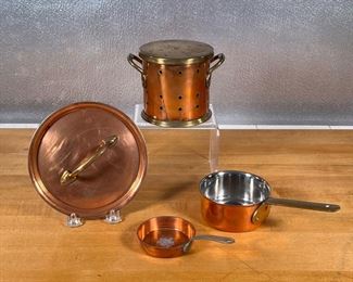 (4pc) MISC. COPPER COOKWARE  |
Including a lidded sifter, a small copper pot (overall l. 8 in.), and a small Restaurant Lasserre 3-inch frying pan; plus a single pot lid (dia. 6.5 in.)