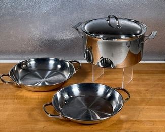 (3pc) STAINLESS COOKWARE  |
Stainless steel, unmarked but likely all Cuisinart, including a pot with steamer insert (h. 5 x dia. 10 in.) and two double handled pans (largest dia. 10.25 in.)