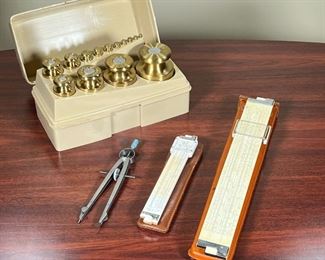 WEIGHTS & DRAFTING TOOLS  |
Including a OHAUS set of balance beam gram weights, and a few drafting tools
