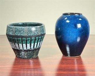 (2pc) POTTERY VASES  |
Pretty! One having a dark blue glaze (h. 5 1/2 in.), and one having green and white details (dia. 4 1/2 in.)