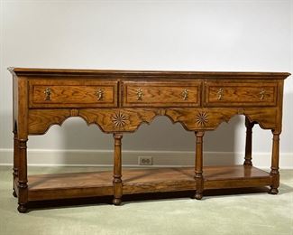 BAKER CONSOLE TABLE  |
Long hall table or sideboard, having three drawers over an open shelf with contrasting inlaid decoration - l. 72 x w. 17.5 x h. 33.5 in.