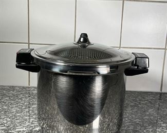 KUHN RIKON PRESSURE COOKER  |
Duromatic stove top pressure cooker of large size, with lid, Swiss made - w. 15.5 in. (over handles); h. 8.75 x dia. 12 in. (pot only)