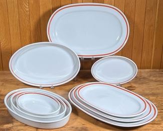(9pc) D'AUTEUIL OVAL DISHES  |
French Porcelaine D'Auteuil Bistro Rust Orange serving pieces / bakeware, including two 16.5 x 10-3/4 in. oval platters and two smaller platters, two 13.5-inch baking dishes, and three smaller oval baking dishes