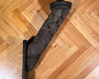 BAROQUE CARVED SCONCE  |
Architectural element with carved scrollwork designs mounting a large pricket candle holder - l. 8 x w. 6.5 x h. 33 in.