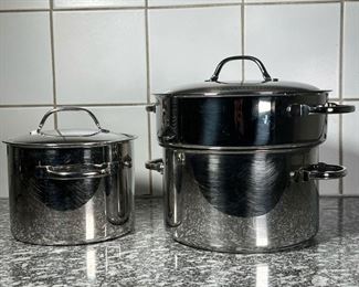 (2pc) STAINLESS COOKWARE  |
Stainless steel cookware of good quality, including a 8 inch pot, and a 5.75 inch tall 9.25 inch pot with steam insert, with two lids, no pieces appear to be marked