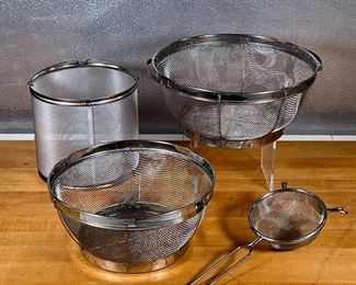 (4pc) SIFTERS & STRAINERS  |
Including a cylindrical strainer/sifter (h. 6.75 in.), a small handheld mesh sister, and two round strainers (largest dia. 11 in.)