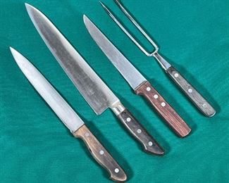 (4pc) MISC. CHEFS KNIVES  |
Including two Alfred Zanger Japan knives and a Zanger pitchfork (longest 15 in. overall) and a Zanger "James Beal" knife (blade l. 7 in.)