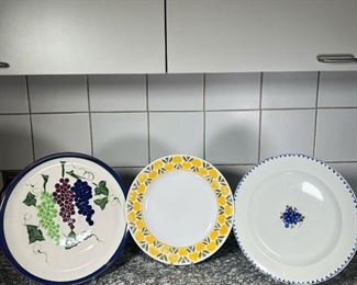 (3pc) MISC FRUIT DESIGN PLATES  |
One showing various grape decorations (dia. 13 1/2 in.), another showing purple grapes (dia. 13 in.), and one with a border of golden apples (dia. 12 in.)