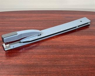 SWINGLINE LONG REACH STAPLER  |
Model 44-12 stapler with inch markings - l. 16.75 x w. 1.75 in.
