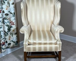 BAKER WINGCHAIR  |
Chippendale style wing chair with textured striped fabric - l. 33 x w. 33 x h. 45 in.