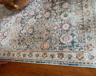 Almost square  rug…see next picture for exact size