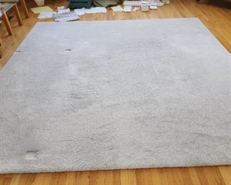 white area rug.  146" x 108"