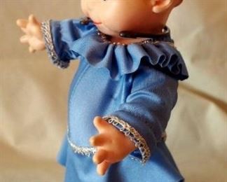 Kewpie Doll Collection, Kewpie Doll On Ice Skates And Metal Stand, Coffee Mug, Kewpies And The Runaway Baby Book And More