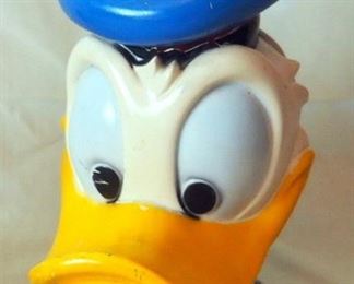 1970s Walt Disney Hard Rubber Donald Duck Coin Bank And 1960s Hard Rubber Posable Snoopy Peanuts Figure