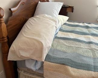 full size bed has matching dressers and nightstands