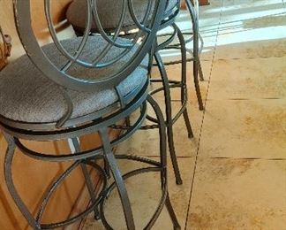 Four swivel bar stools