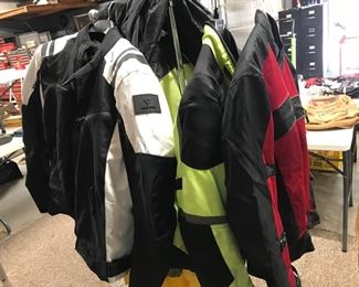 riding jackets, and rain gear, gloves, helmets