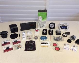 MMT155 Camera Lens, Memory Phone, Alarm Clocks, Sony Radio, Apple Ear Buds, Tech Accessories & More!