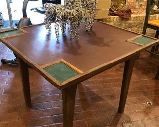 Leather topped, primitive game table