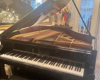 Black lacquer baby grand piano