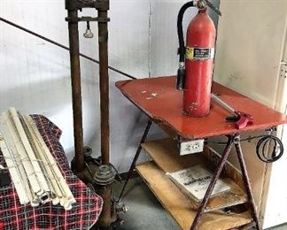 Antique wood lathe, table, fire extinguisher, roll of twine