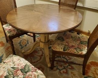 Vintage dining table w/ 4 cane back chairs