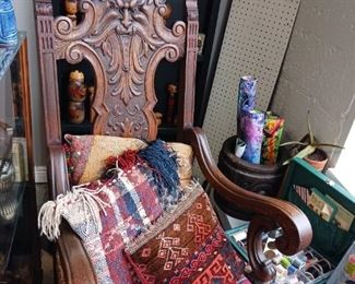 Funky carved back chair with a warlock