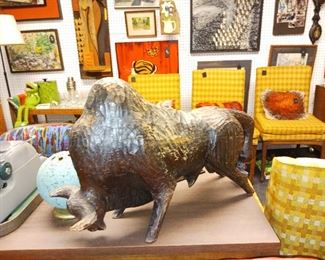 Carved bull figurine sculpture