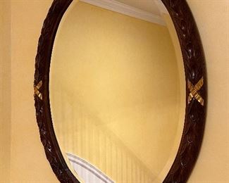 Carved Oval Mirror with Gold Accents