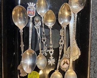 Nine sterling teaspoons collected in Europe.