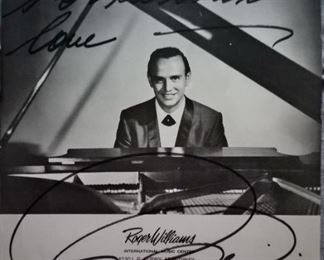 Roger Williams, the Hall of Fame pianist - 8 X 10 photograph signed in black felt tip.  Picture is not on photography-type paper, but more like regular paper.  Signed, "To Lee with love."  (my mother)