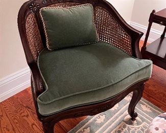 Interesting caned armchair