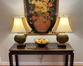 Henredon console table with detail, 2 brass lamps & wall hanging