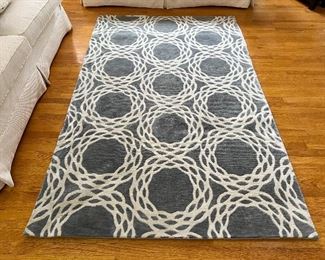 Handmade wool circular pattern rug / 96"L x 60"W
