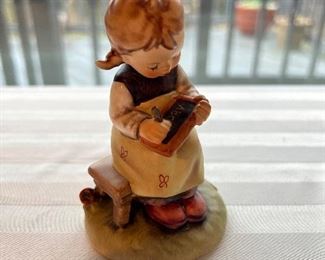 Hummel girl writing figurine