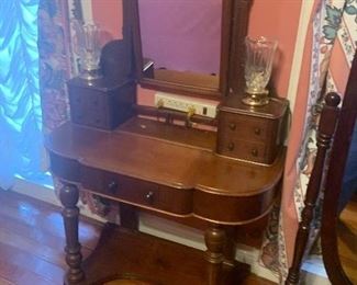 greek revival small dressing table with 5 drawers.