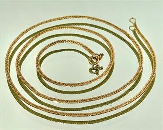 $200: 20" Marked 14K gold chain. Minor kink as shown. Priced as-is. 