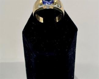 SOLD Marked 14K gold, two genuine .05ct round diamonds on either side of the amethyst. **This ring has an oblong shape to the band vs round. Impossible to know the ring size. Plan to bring this to your jewelry for proper sizing. Runs on the large side. 