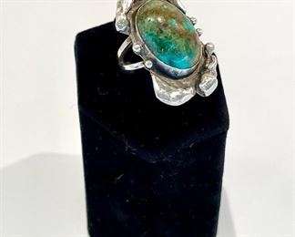 $68, Marked 925 silver, turquoise cocktail ring. Approx 30mm in total length